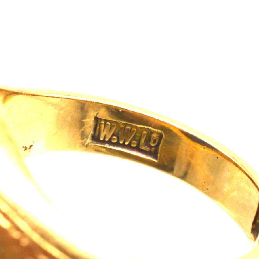 Interior view of a vintage 18ct gold ring showing the maker's mark W.W.LD.