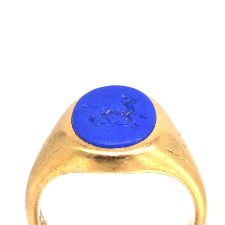 1960s 18ct gold signet ring with blue lapis lazuli intaglio of a wolf, showcasing fine craftsmanship and design.