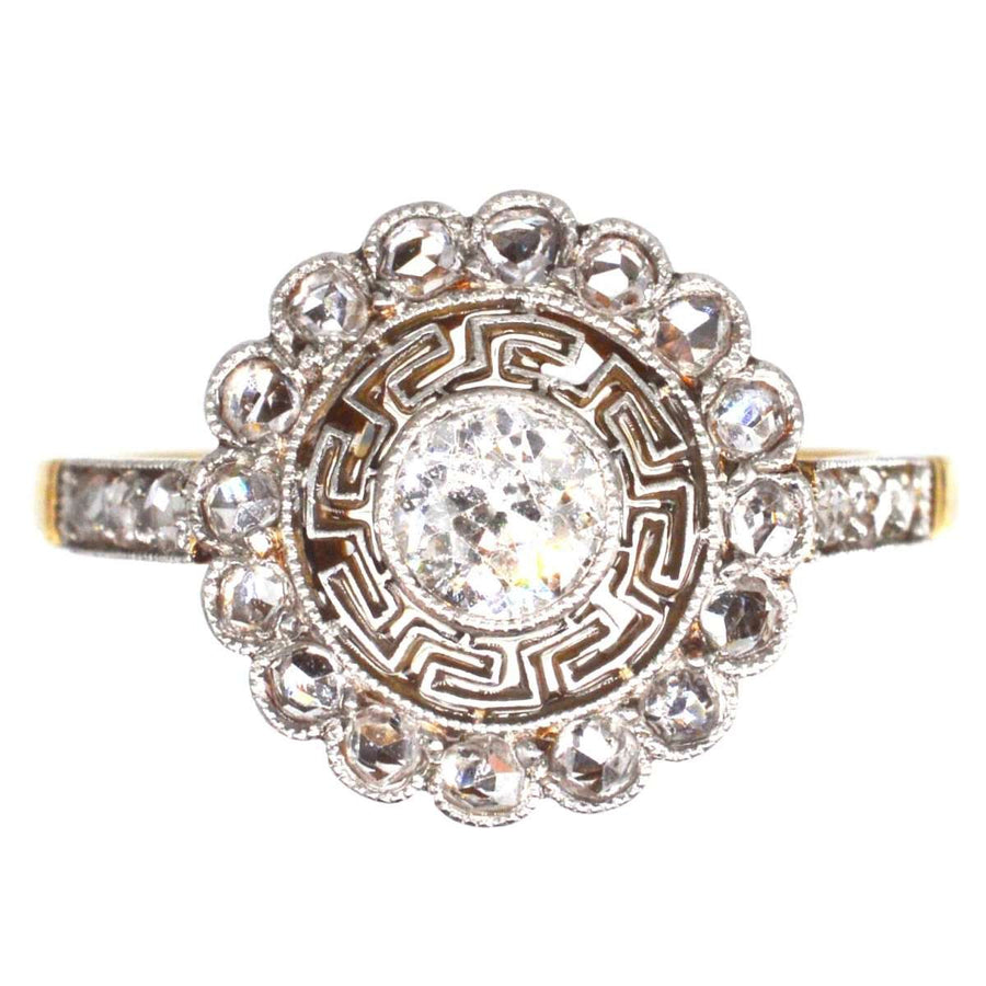 Art Deco 18ct gold and platinum target diamond ring with Greek key details and Old European Cut diamond.