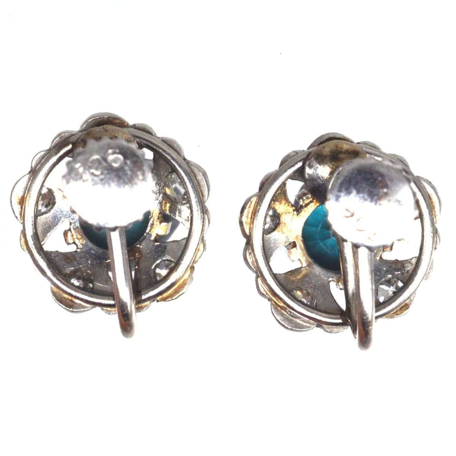 Art Deco 9ct white gold blue zircon and diamond cluster earrings, showcasing intricate design and vibrant stones.