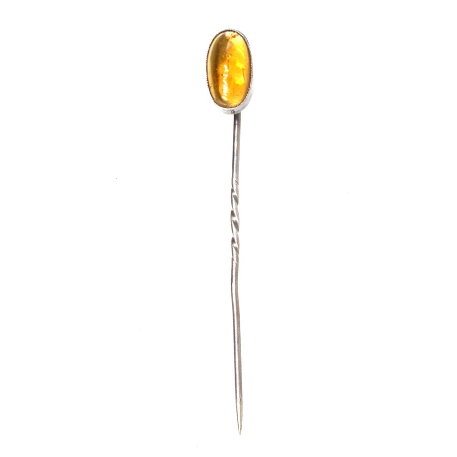 Art Deco silver tie pin featuring natural amber, circa 1920s, with a striking colour and elegant design.