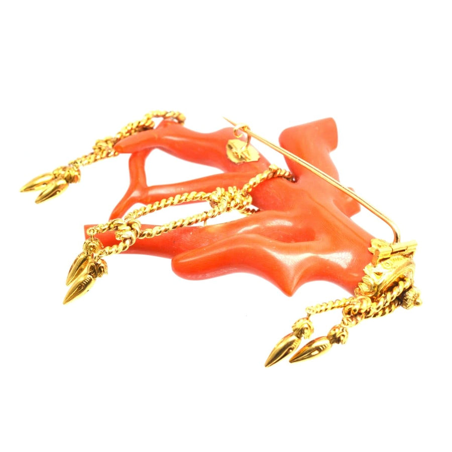Large 19th century red coral branch brooch with gold tassels and rope details, perfect for a stylish lapel.