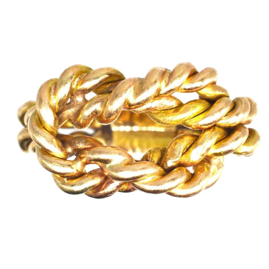 Large Victorian 9ct gold rope lover's knot ring symbolizing love and unity with intricate braided design.