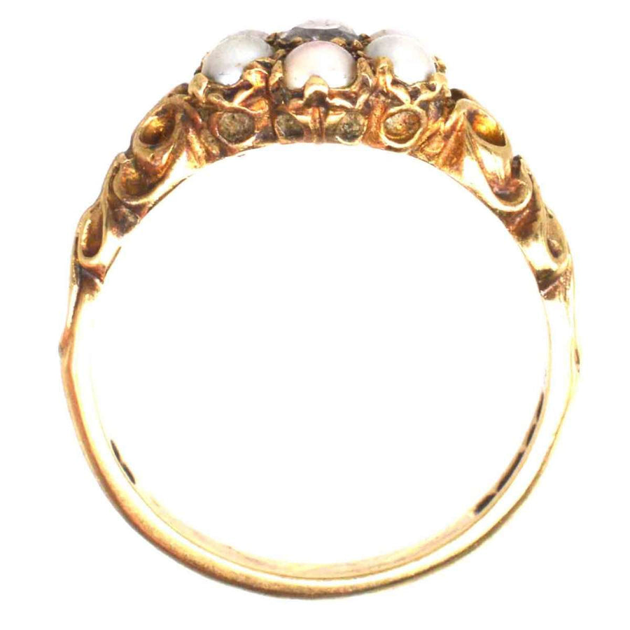 Late Victorian 9ct gold split pearl and diamond cluster ring showcasing intricate detailing from the 1860s.