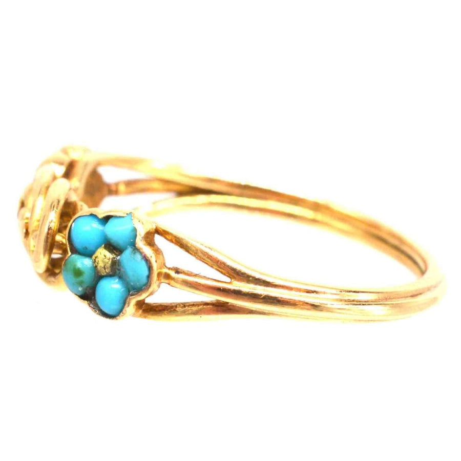 Regency 18ct gold knot ring featuring turquoise forget-me-not flowers, a symbol of enduring love.