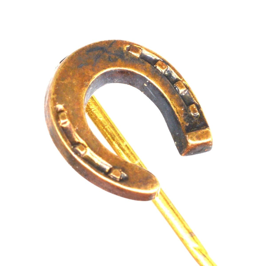 Vintage 15ct gold horseshoe tie pin from 1889, symbolizing luck and crafted by L Spiers jewellers in Birmingham.