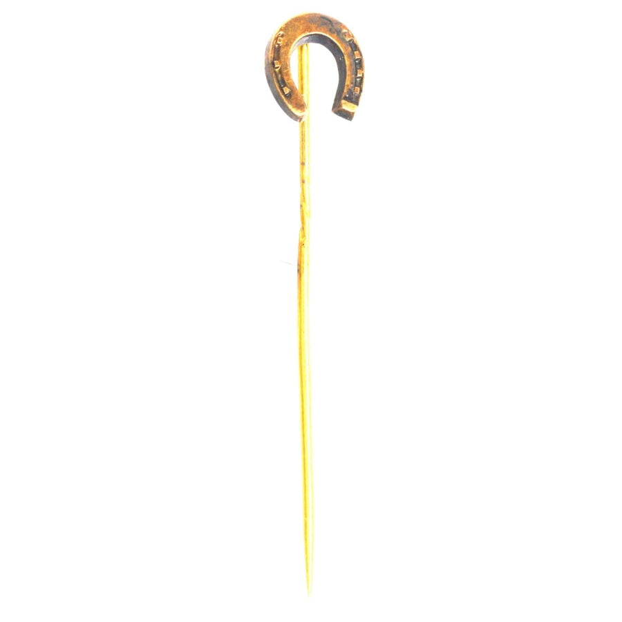 Victorian 15ct gold horseshoe tie pin by L Spiers, assayed in Birmingham 1889, symbolizing luck and style.