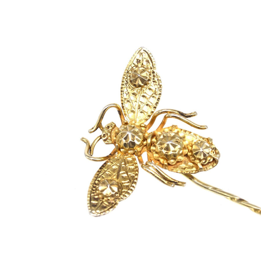 Early 19th Century Regency bee tie pin with intricate gold detailing and sparkling stones.