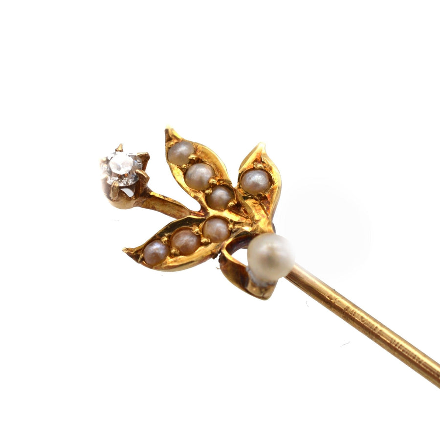 Edwardian 14ct gold tie pin with natural pearls and diamond flower design, perfect for a stylish tie accessory.
