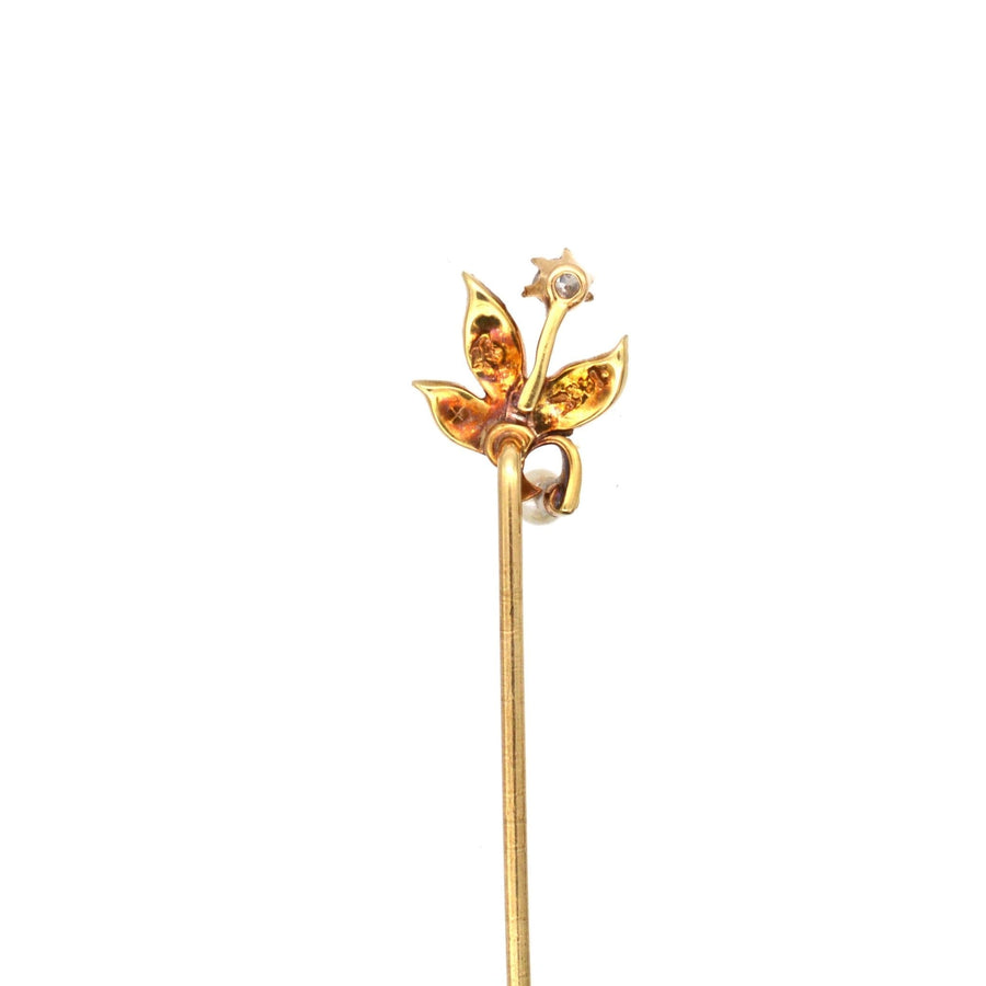 Edwardian 14ct gold tie pin featuring a diamond flower and natural pearl leaves, elegant mens accessory from the 1900s.