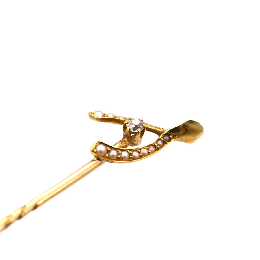 Edwardian 15ct gold wishbone tie pin adorned with seed pearls and a diamond, a perfect gift for a husband.