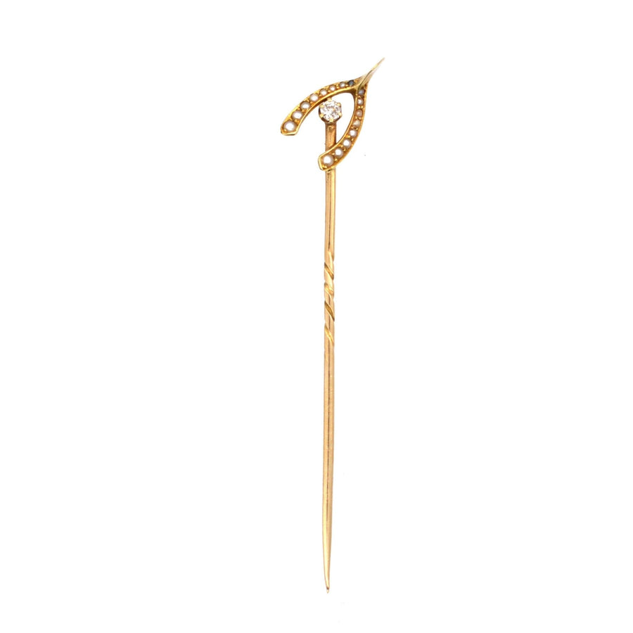 Edwardian 15ct gold wishbone tie pin adorned with seed pearls and diamond, vintage jewelry circa 1900.