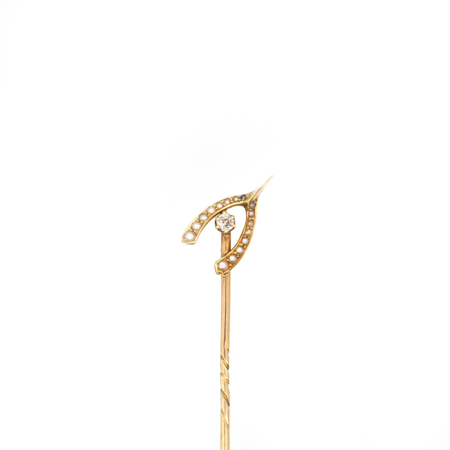 Edwardian 15ct gold wishbone tie pin adorned with seed pearls and diamond, a vintage gift for a future husband.