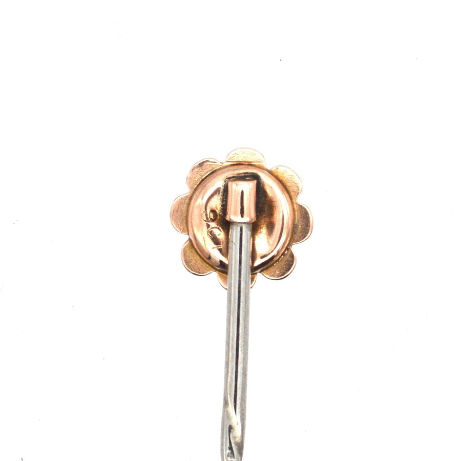 Back view of a vintage 9ct gold tie pin featuring a star design and old cut diamond, perfect as a gift.