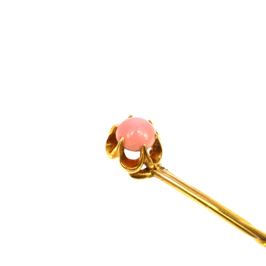 Victorian 18ct gold tie pin featuring a rare round conch pearl, elegantly crafted and certified for authenticity.