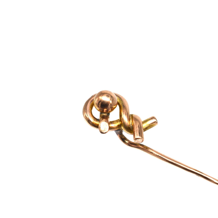 Victorian 9ct gold twist knot tie pin, symbolizing love with an elegant design, complete with a stopper.