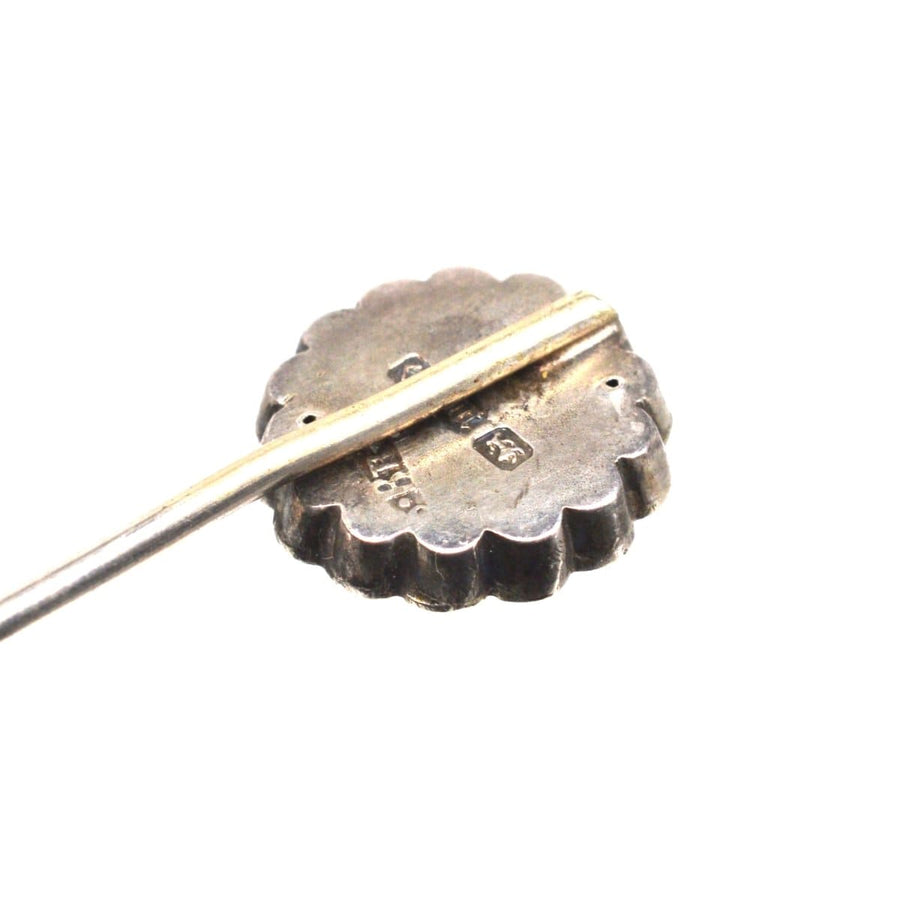 Victorian silver 'Victoria Regina' tie pin, made in 1886, featuring intricate design and historical significance.