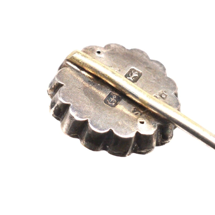 Victorian Silver 'Victoria Regina' tie pin showing detailed craftsmanship and hallmark from 1886.